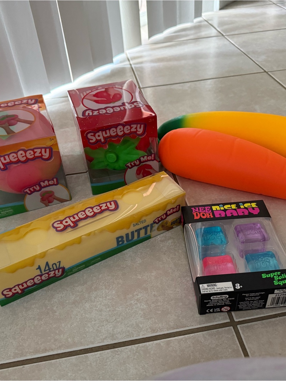 Squeeze Squeezezy Kids Toys - Orange, Yellow, Pink, Green, Blue, Purple